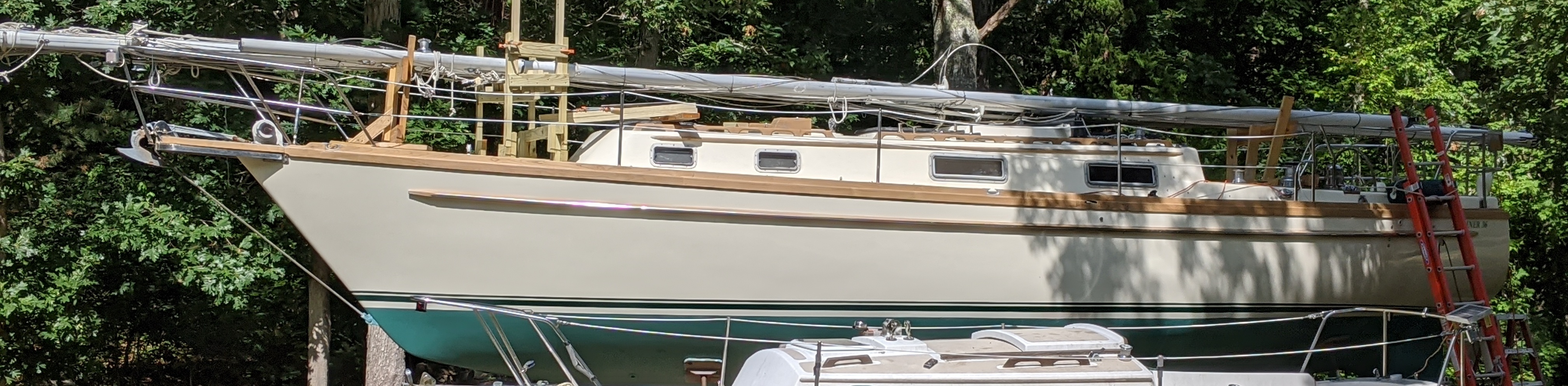 Mariner 36 in side yard in September 2020